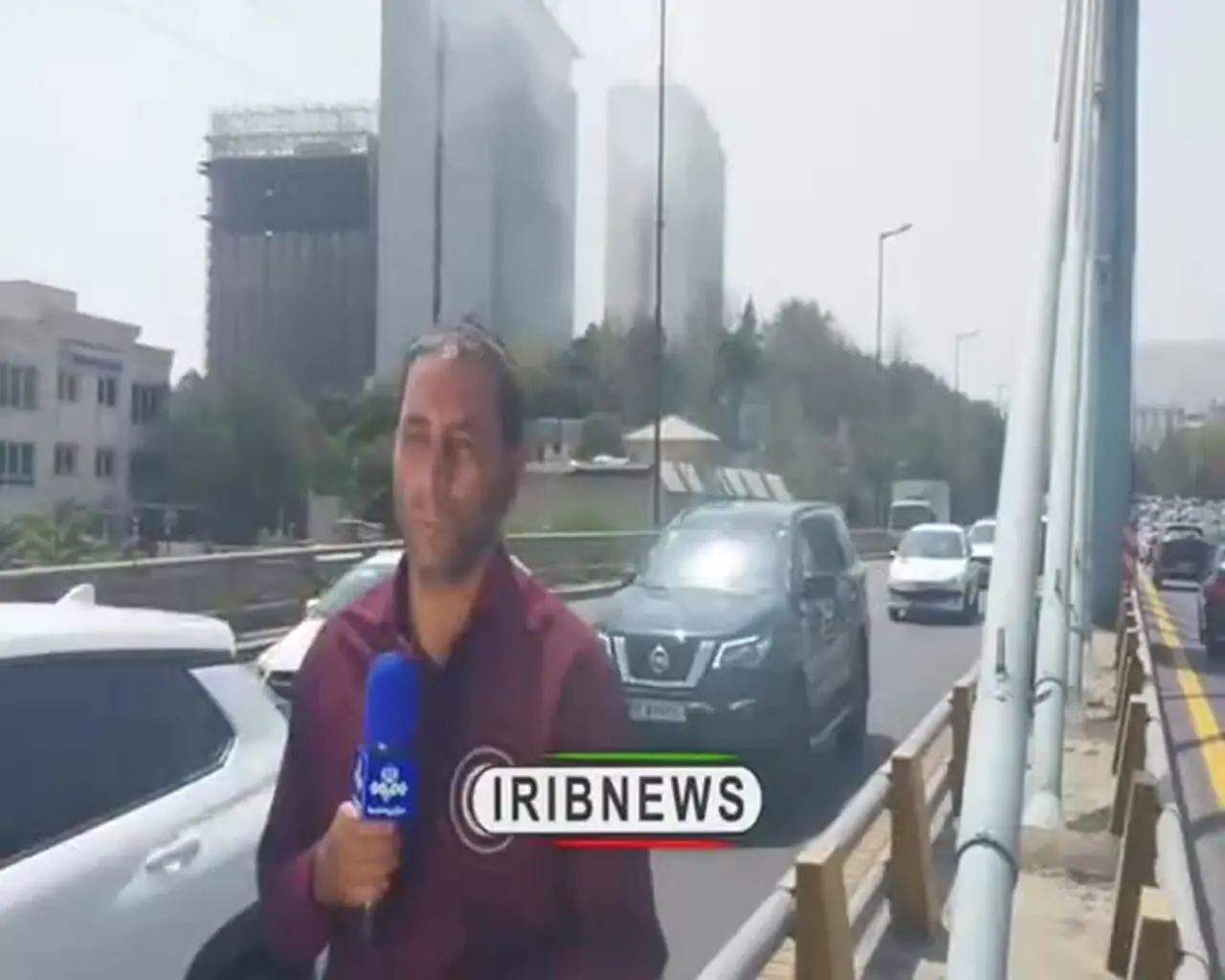 فیلم حمله به خبرنگار صداوسیما هنگام تهیه گزارش در آتش سوزی هتل استقلال
